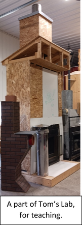 A fireplace with tall chimney and a smaller 5-foot chimney are in the Chim-Scan® teaching lab.