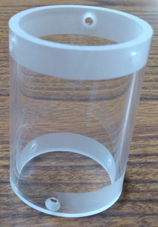 The clear cylindrical lens cover features holes predrilled for attachment to the Lighthouse Camera.