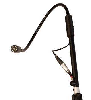 Chim-Scan® Enviro Camera attached to a telescoping pole. The camera has 9 LED lights.